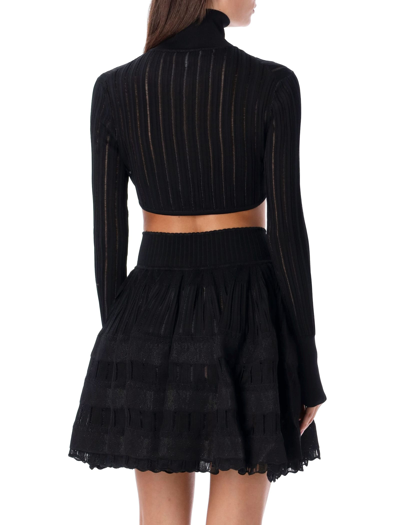 Alaïa Long Sleeved Knitted Cropped Cardigan In Black