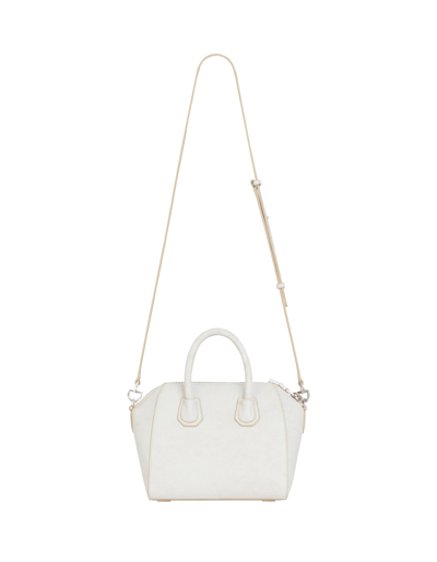 Shop Givenchy Mini Antigona Bag In Ivory Leather With Aged Effect In Bianco