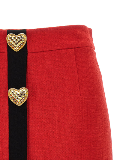 Shop Moschino Heart Button Skirt In Red