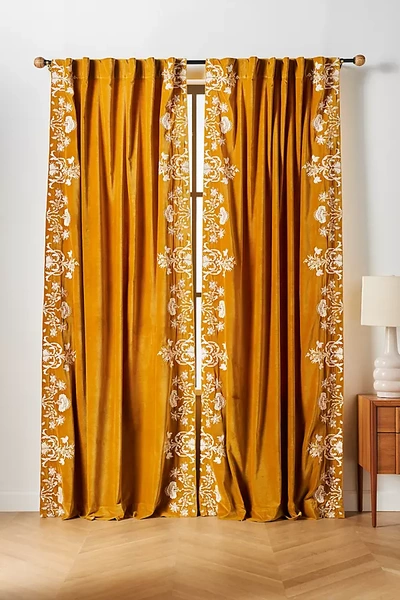 Shop Anthropologie Embroidered Velvet Harlowe Curtain By  In Yellow Size 50" X 96"