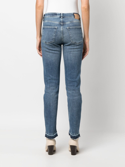 Shop Ag Girlfriend Distressed Tapered Jeans In Blue