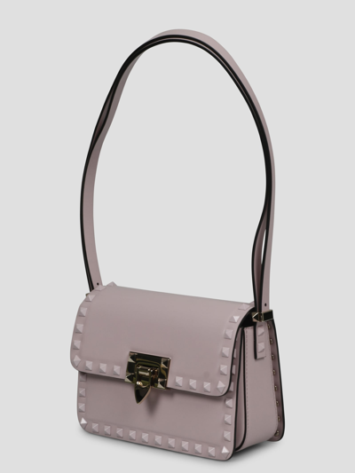 Shop Valentino Small Rockstud23 Shoulder Bag In Pink & Purple