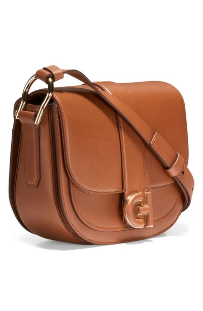 Shop Cole Haan Mini Essential Saddle Bag In British Tan