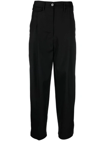Shop Totême Pants In Black