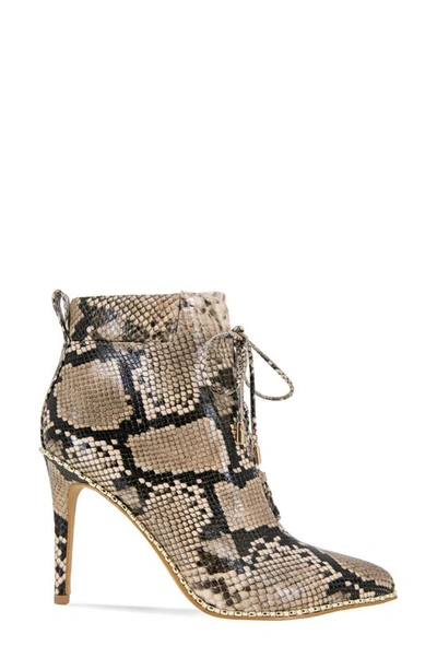 Shop Bcbgeneration Hinna Pointy Toe Lace-up Bootie In Natural Snake