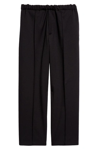 Shop Jil Sander Relaxed Fit Elastic Waist Tapered Leg Ankle Trousers In Black