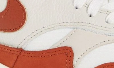 Shop Nike Gender Inclusive Air Max 1 Lx Sneaker In Sail/ Rugged Orange/ Brown