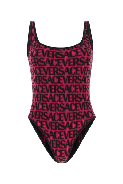 Shop Versace Swimsuits In Blacktropicalpink