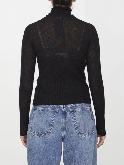 Shop Saint Laurent Ribbed Knit Turtleneck In Black