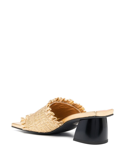 Shop Ganni Smock 65mm Ruched Mules In Gold