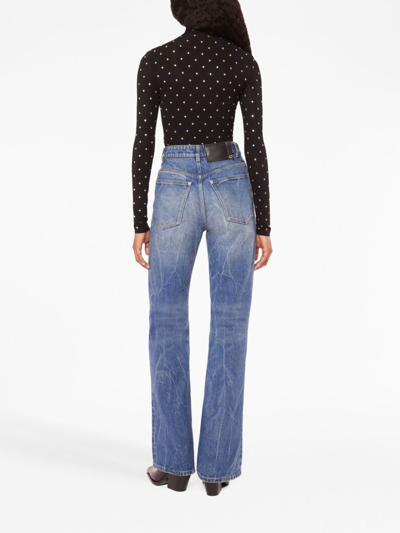 Shop Rabanne Disc Flared Jeans In Blue