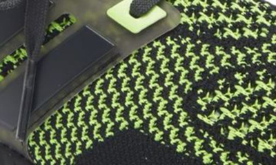 Shop Adidas Originals Ultraboost 1.0 Dna Sneaker In Black/ Carbon/ Lemon