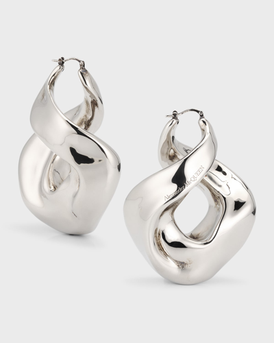 Shop Alexander Mcqueen Twisted Hoop Earrings In Silver