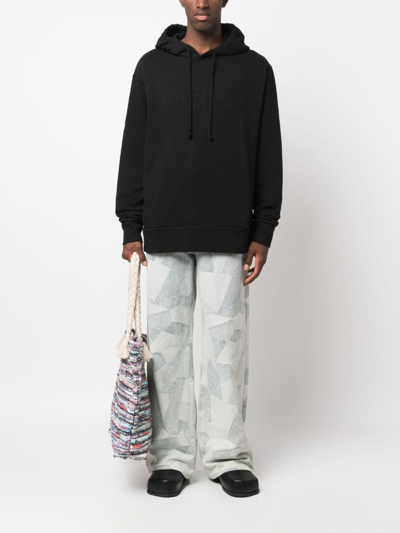 Jw Anderson Logo Embroidered Hoodie In Black