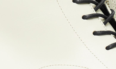 Tory Burch Embossed Logo Lace-up Combat Boot In Blanc