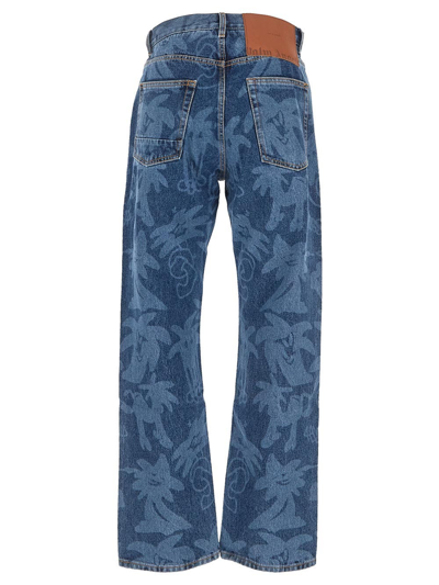 Shop Palm Angels Palm Motif Jeans In Blue