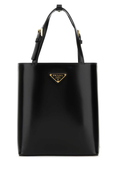 Shop Prada Triangle Logo Plaque Cylinder Shaped Tote Bag In Black