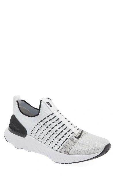 Shop Nike Gender Inclusive React Phantom Run Flyknit 2 Running Shoe In White/ White
