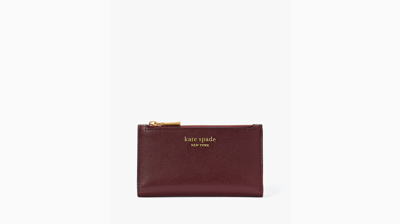 Shop Kate Spade Morgan Small Slim Bifold Wallet In Cordovan