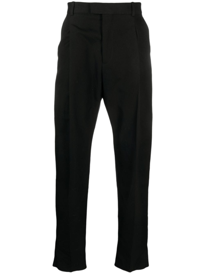 Shop Alexander Mcqueen Pleated Slim-leg Trousers In Black