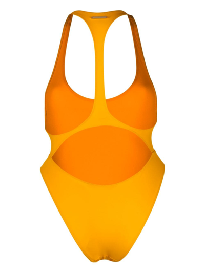 Shop Stella Mccartney Logo-print Cut-out Swimsuit In Gelb
