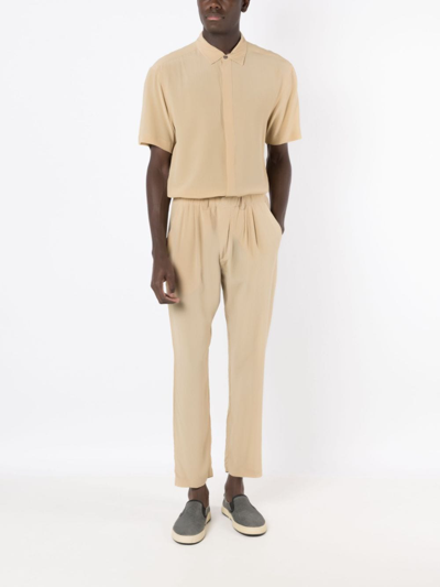 Shop Handred Pleated Silk Loose-fit Trousers In Neutrals