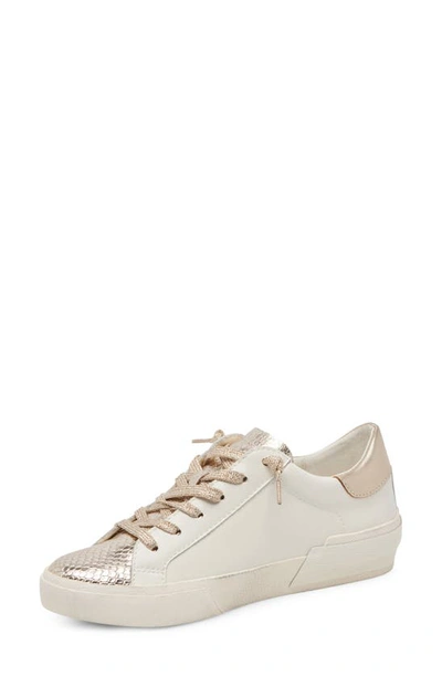 Shop Dolce Vita Zina Sneaker In White/ Gold Leather