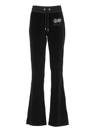 Shop Moschino Jeans Logo Embroidered Flared Trousers In Black