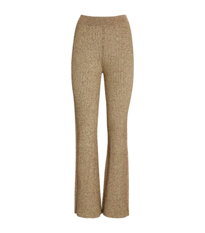 Shop Ganni Knitted Flared Trousers In Beige