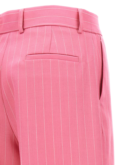 Shop Msgm Pinstripe Pants In Pink