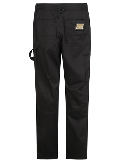 Shop Dolce & Gabbana Loose-fit Buttoned Trousers In Black