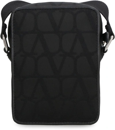 Shop Valentino Garavani - Nylon Messenger Bag In Black