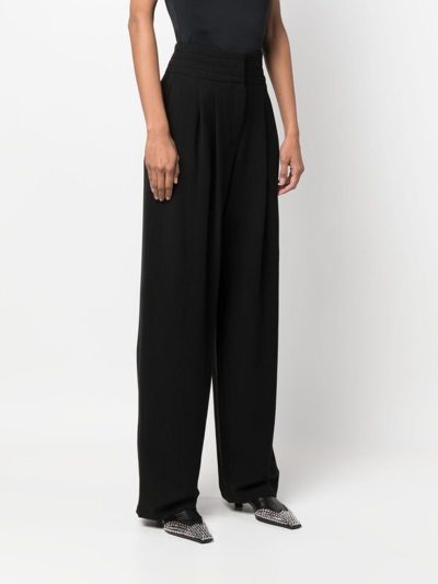 Shop Iro Pleat-detail Wide-leg Trousers In Black