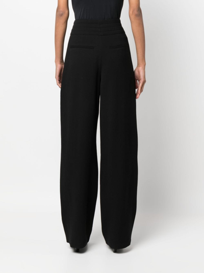 Shop Iro Pleat-detail Wide-leg Trousers In Black