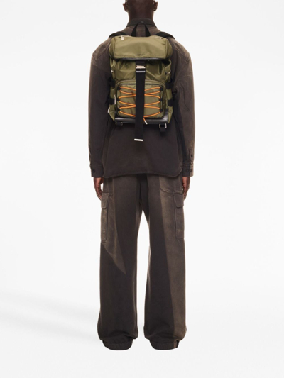 Off-white Courrie Flap Drawstring Backpack In Green