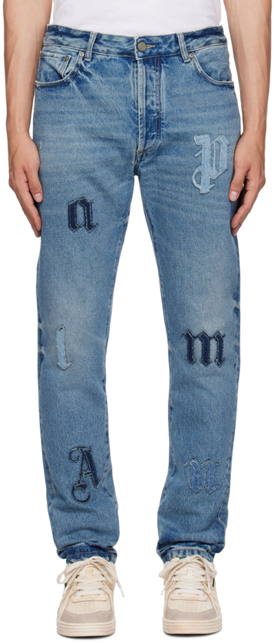 Shop Palm Angels Blue Patch Jeans In Light Blule