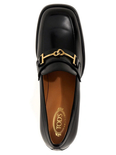 Shop Tod's Chain Loafers Pumps Black
