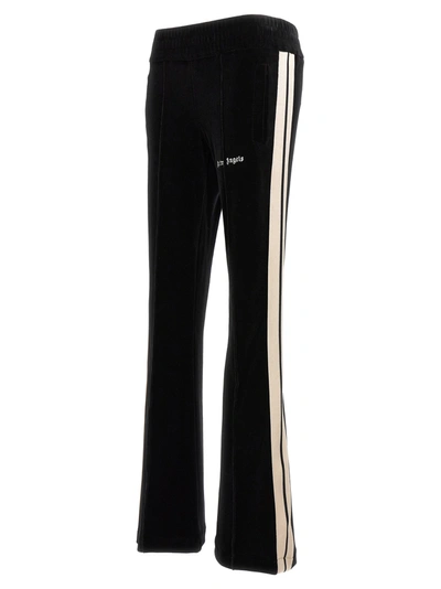 Shop Palm Angels Velvet Joggers Pants In White/black