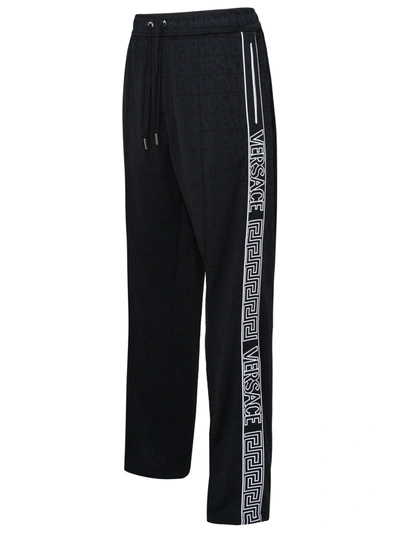 Shop Versace Black Polyester Pants Man