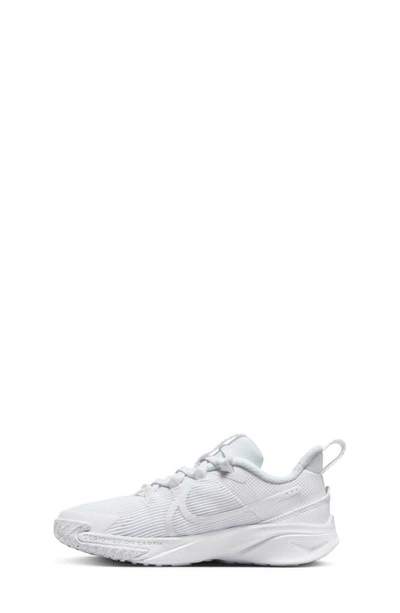 Shop Nike Kids' Star Runner 4 Sneaker In White/ White/ White/ Platinum