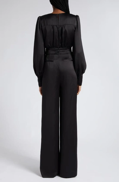 Shop Ramy Brook Madelane Plunge Long Sleeve Satin Jumpsuit In Black