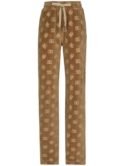 Shop Dolce & Gabbana Allover Logo Cotton Trousers In Camel