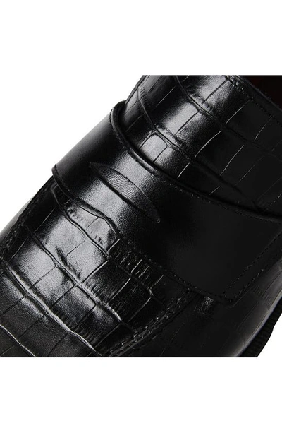 Shop Bruno Magli Nathan Croc Embossed Penny Loafer In Black Croc