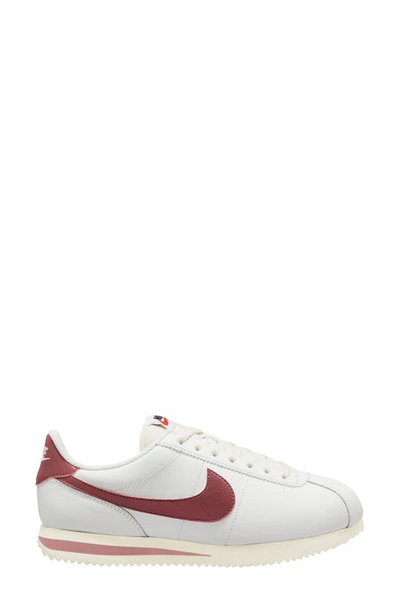 Shop Nike Cortez Sneaker In White/ Cedar-red Stardust-sail
