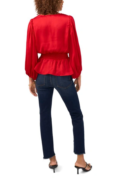 Shop Vince Camuto Smocked Peplum Blouse In Vermillion