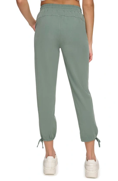 Shop Andrew Marc Sport Sueded Piqué Ankle Crop Joggers In Fern