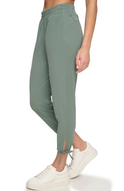 Shop Andrew Marc Sport Sueded Piqué Ankle Crop Joggers In Fern