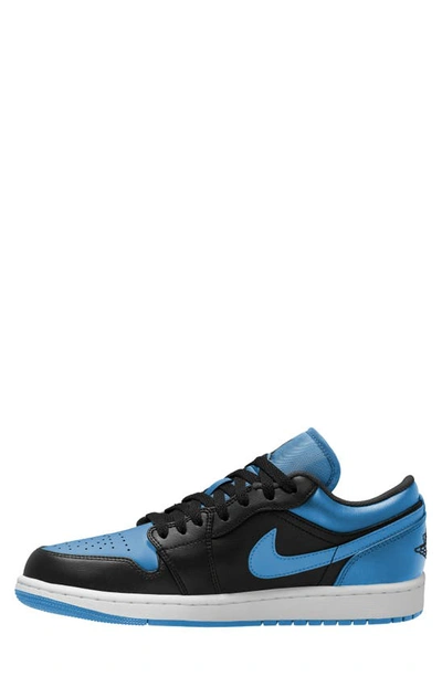 Shop Jordan Air  1 Low Sneaker In Black/ Black/ University Blue