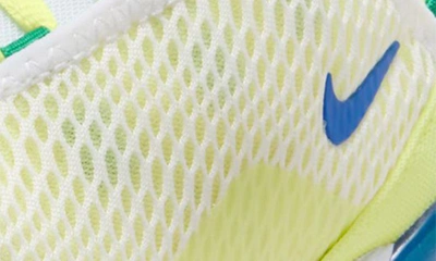 Shop Nike Kids' Air Max 270 Bp Sneaker In White/ Game Royal/ Lemon Twist