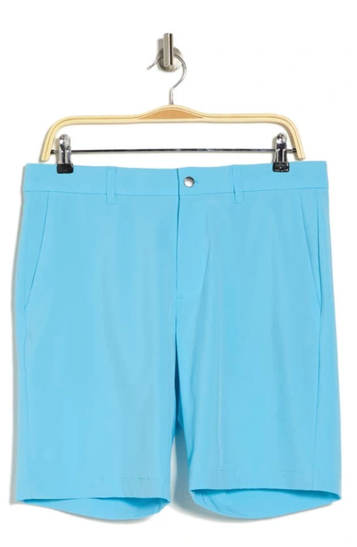 Shop Callaway Golf 9" Flat Front Shorts In Blue Grotto